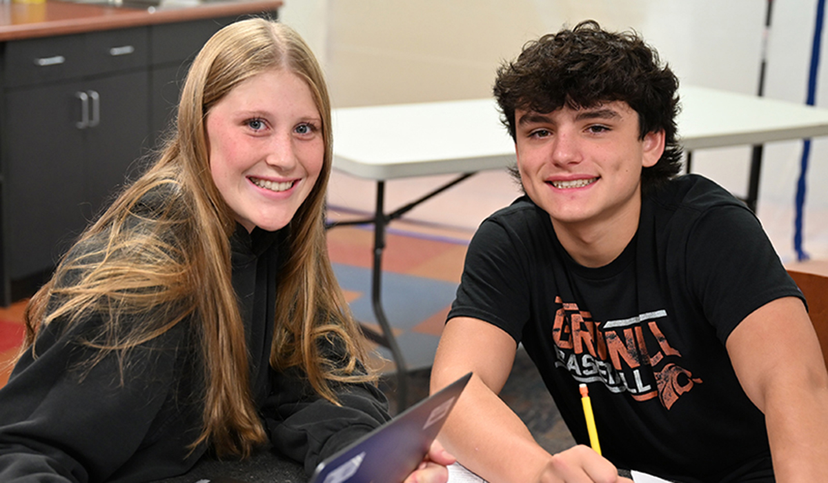 Grinnell students sitting at table studying