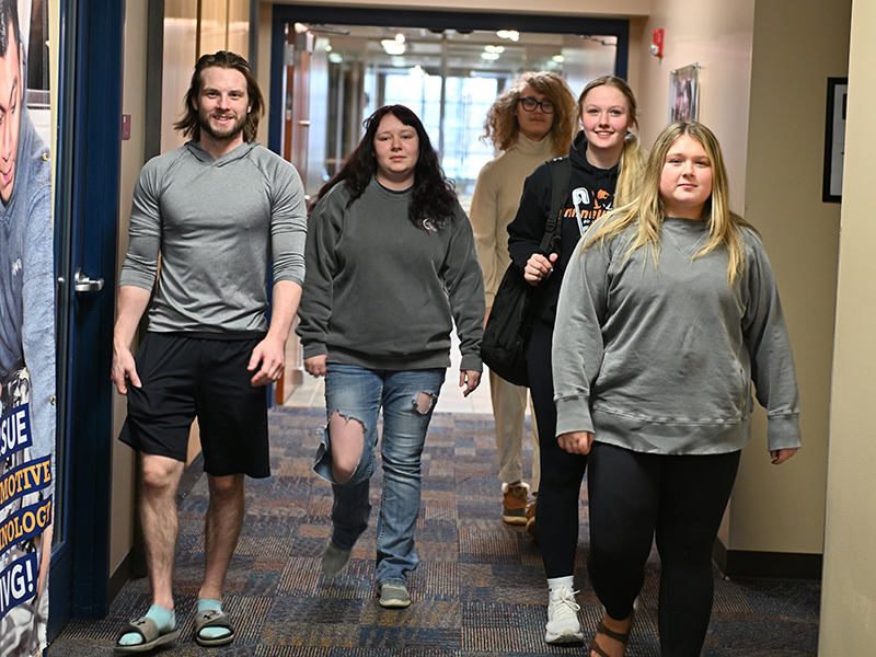 students-walking-in-hallway-grinnell