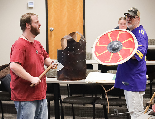 looking at shields and swords